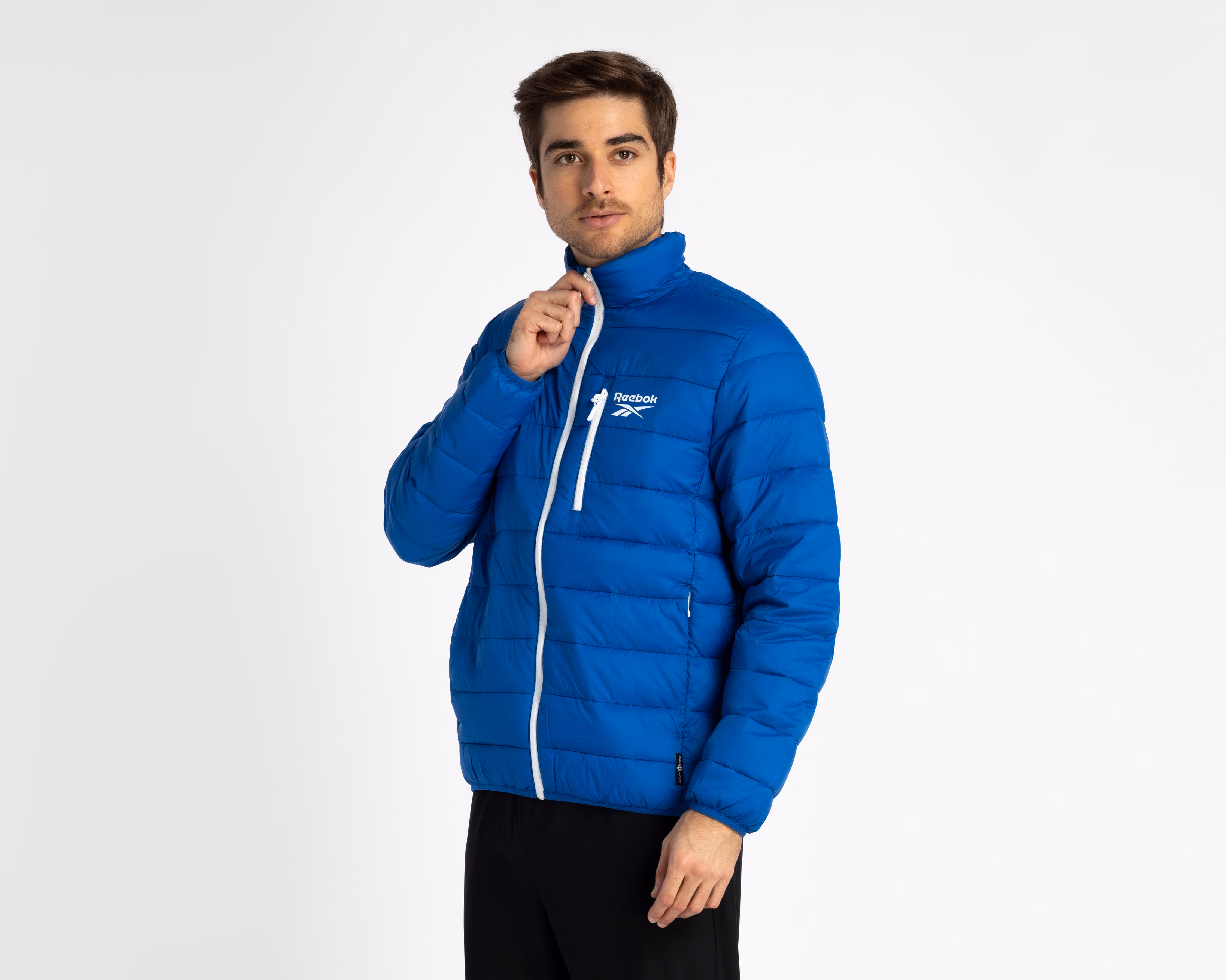 Coppel: Chamarra capitonada (peleonera) Reebok Varias tallas