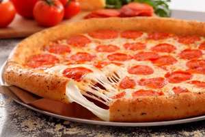 Domino’s y BanCoppel: Pizza Grande (4 ingredientes ó especialidad) + Papotas x $199.00